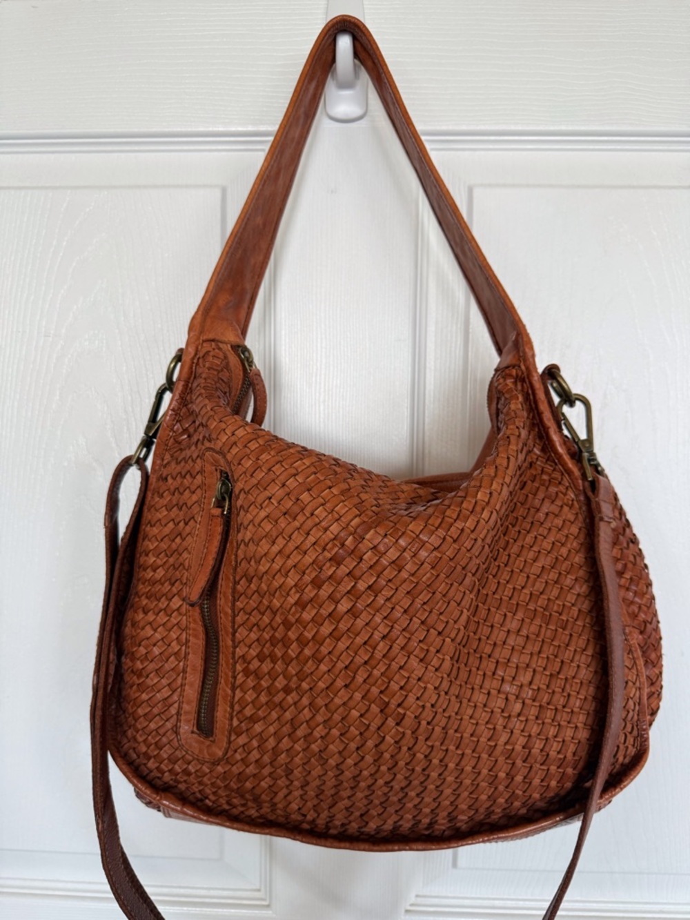 Leather bag woven and smooth sides. Crossbody or shoulder style. Brass hardware